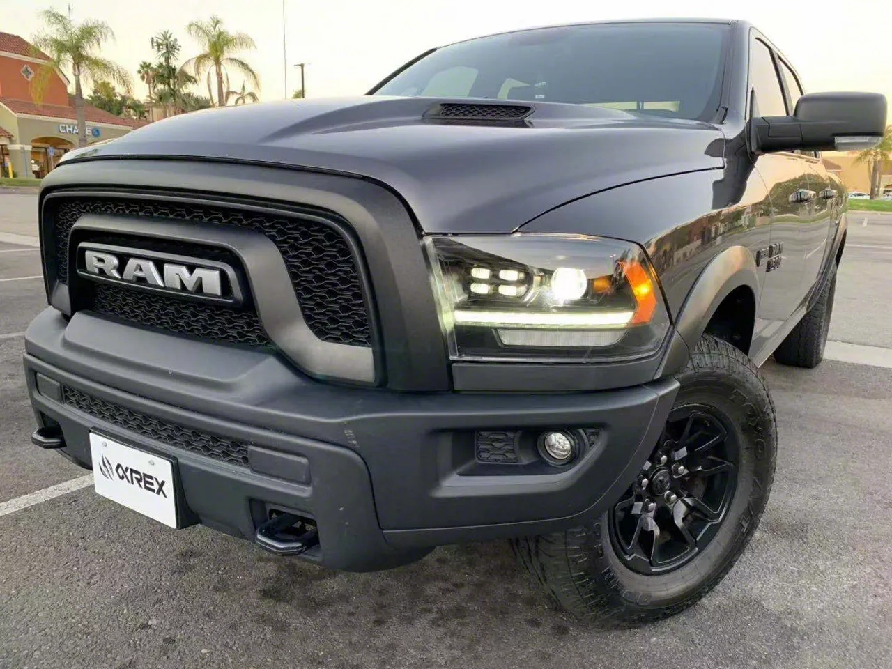AlphaRex PRO-Series 2500 Style Projector Headlights; Matte Black Housing; Clear Lens (13-18 RAM 1500 w/ Factory Projector Headlights)