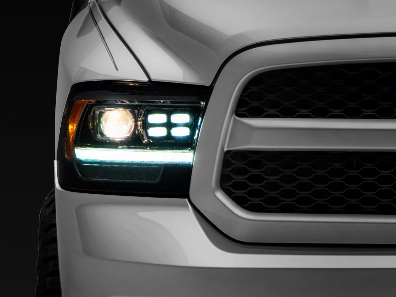 AlphaRex PRO-Series 2500 Style Projector Headlights; Matte Black Housing; Clear Lens (09-18 RAM 1500 w/ Factory Halogen Non-Projector Headlights)