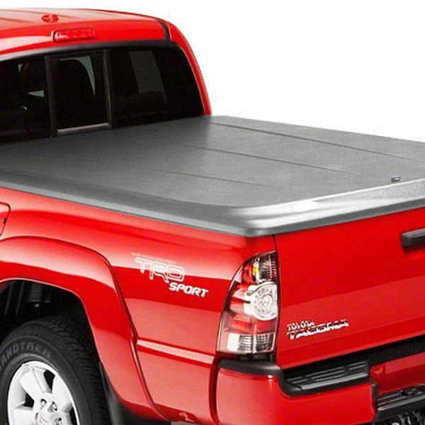 UnderCover Elite Smooth Hinged Tonneau Cover; Unpainted (20-26 Silverado 2500 HD w/ 6.90-Foot Standard Box)